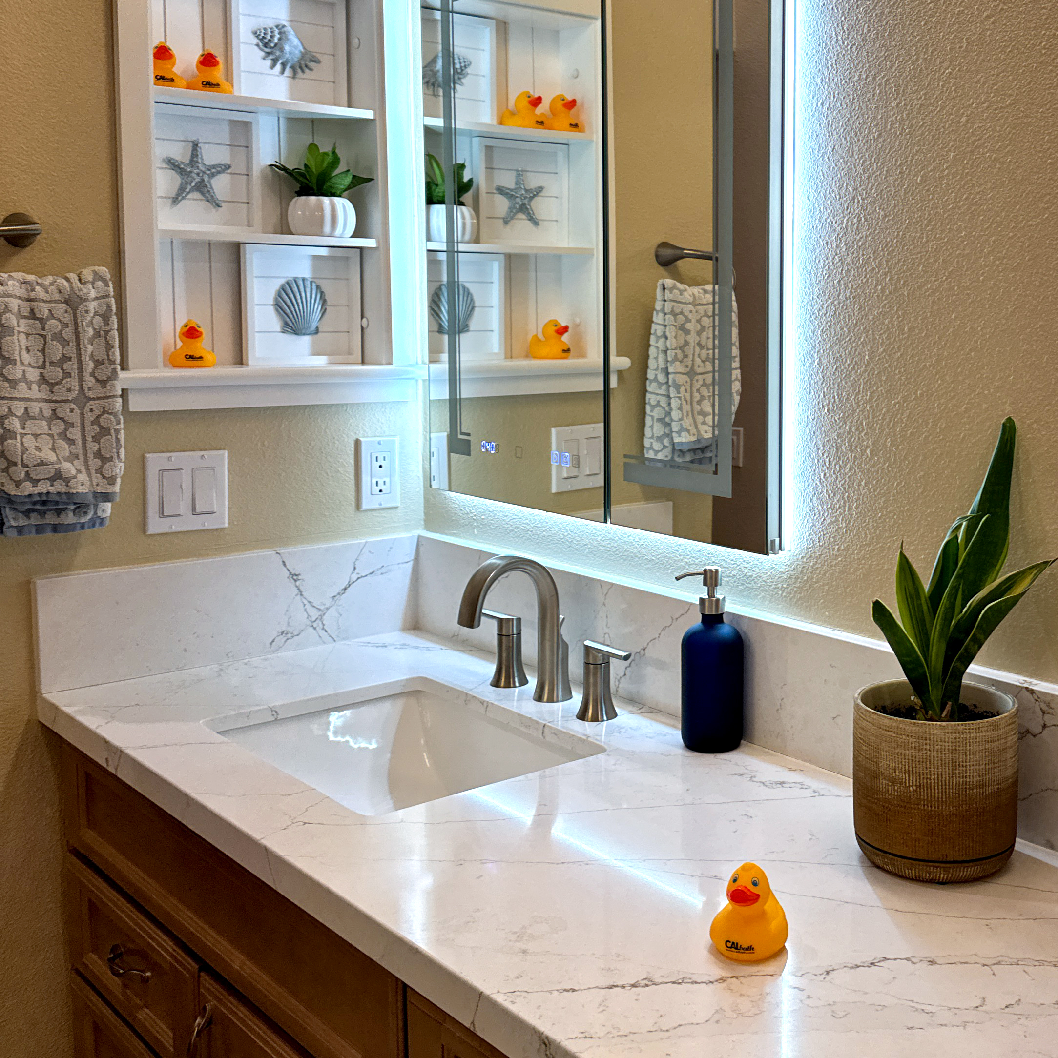Bright Escondido bathroom remodel with scale-resistant fixtures and clean tile work by CALbath Renovations