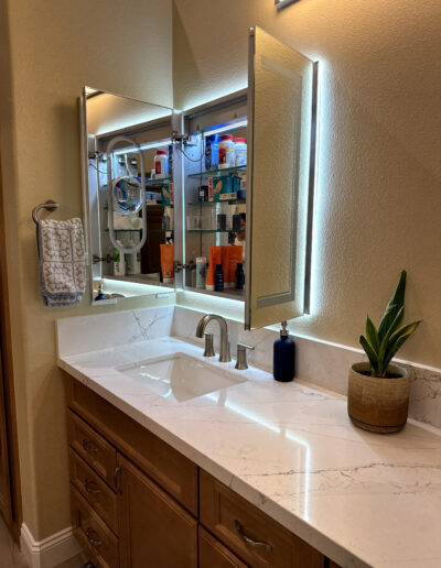 Full bathroom remodel in Poway with glass shower enclosure, updated vanity, and custom tile