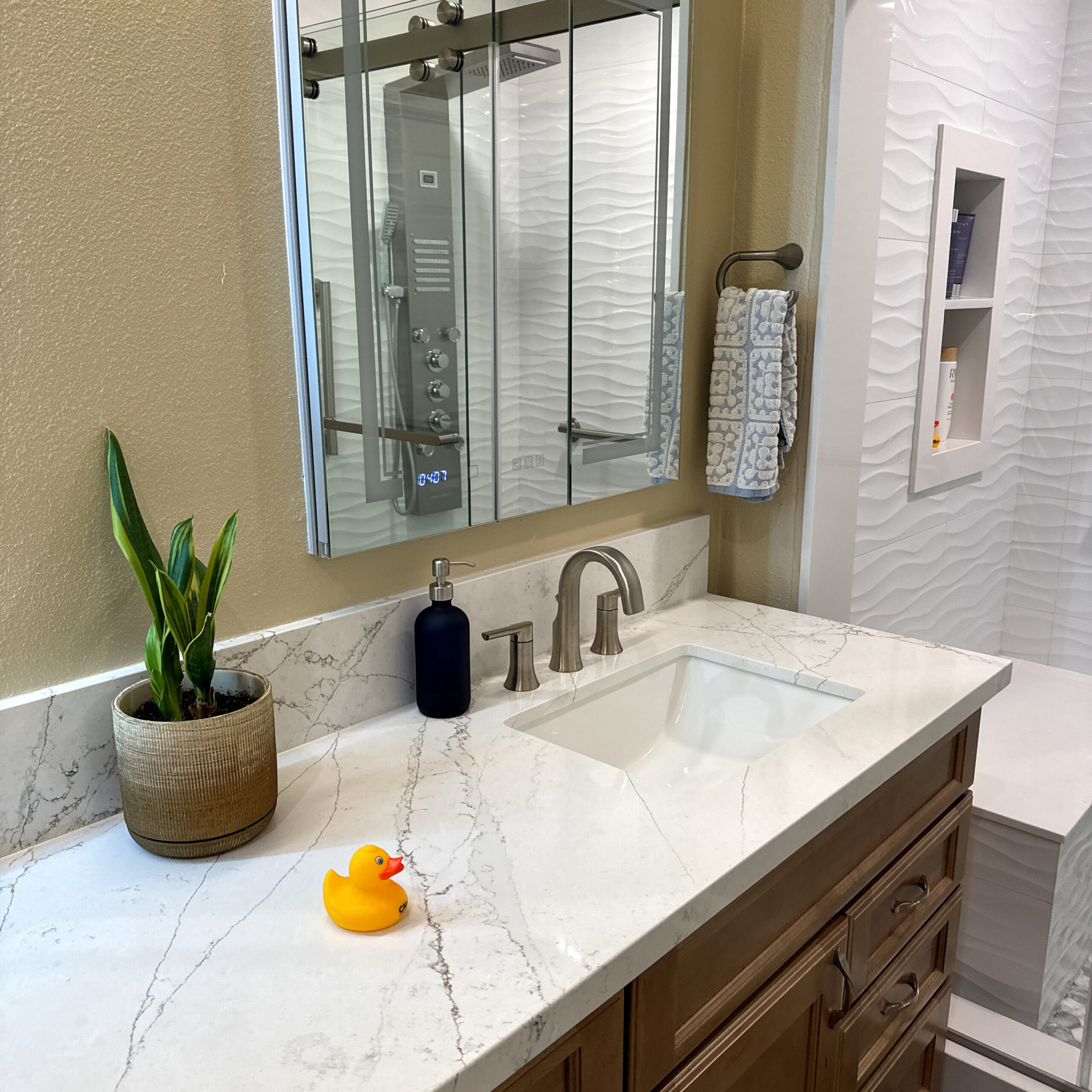Bright Poway bathroom remodel with scale-resistant fixtures and clean tile work by CALbath Renovations
