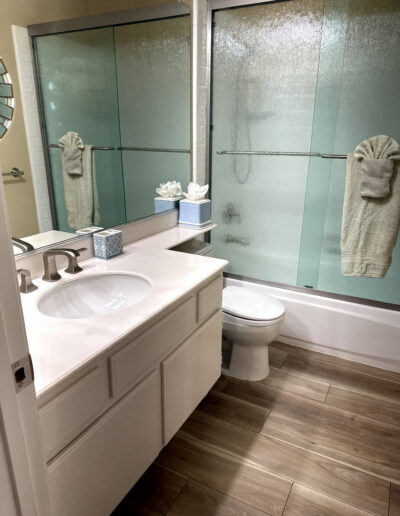 CALbath installer fitting an easy-clean shower surround during a Poway bathroom renovation