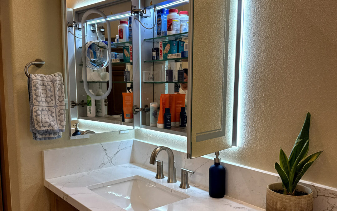 Full bathroom renovation in a Bellflower multi-family property with low-maintenance wall panels and updated fixtures