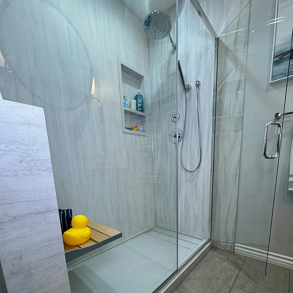 Tub-to-shower conversion in a Carson, CA home with a low-threshold entry by CALbath Renovations