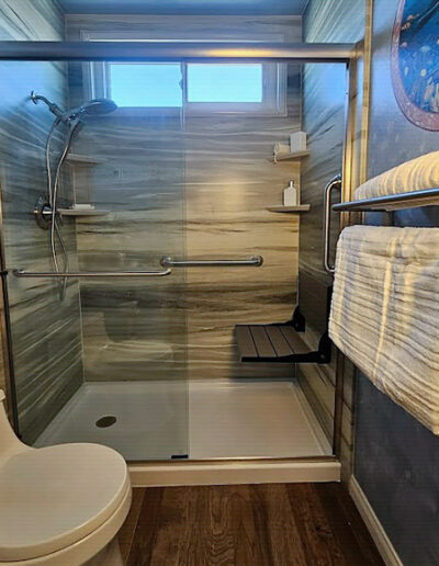 Tub-to-shower conversion in a Compton, CA home with a low-threshold entry by CALbath Renovations