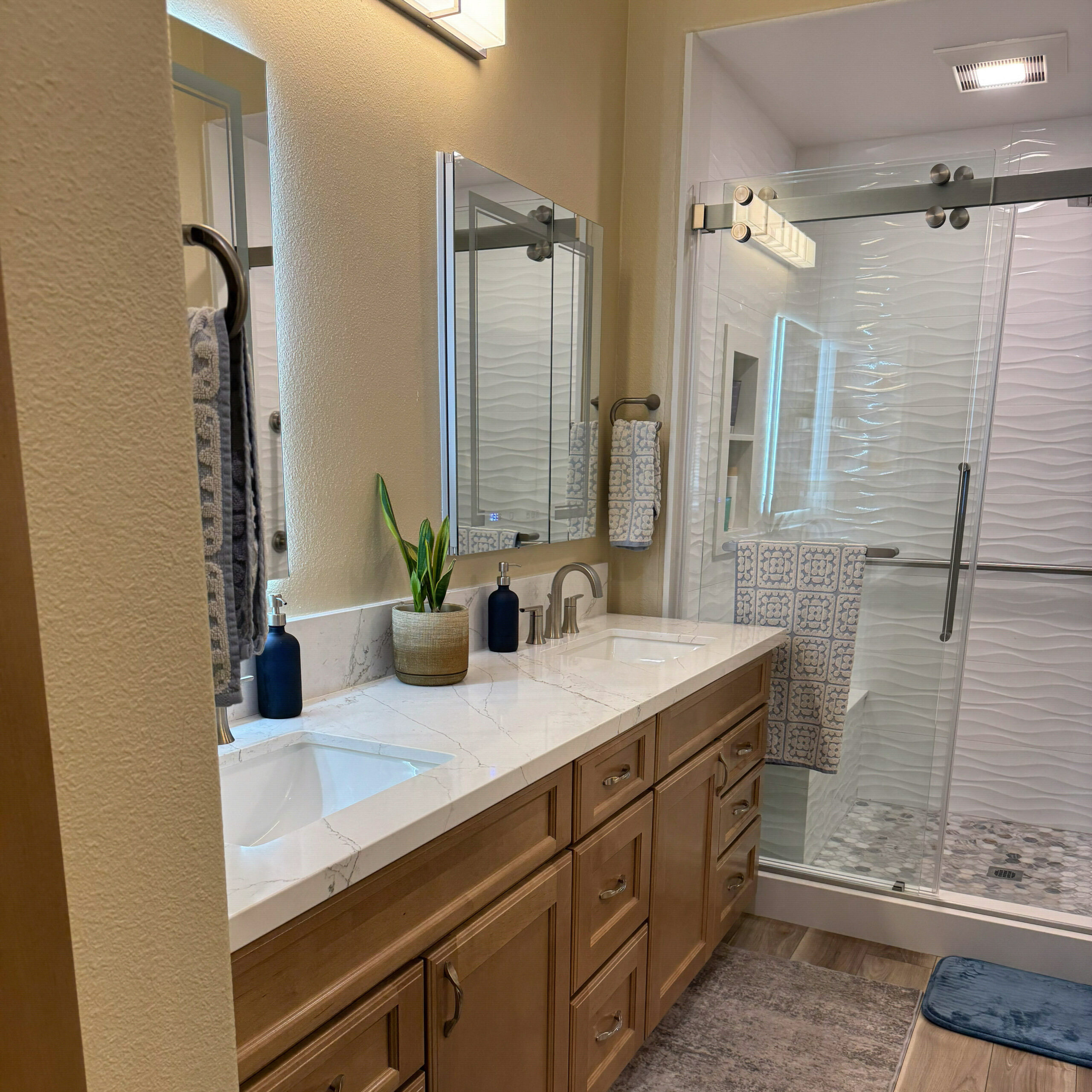 Tub-to-shower conversion in a Whittier, CA home with a low-threshold entry by CALbath Renovations